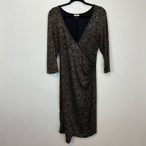 Olivia Matthew’s Black and gold sparkly dress. Size M